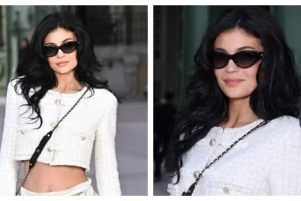 Kylie Jener is exposed under the tinted ABS in the trimmed jacket and the mini -skirt look at the Chanel show during the Paris Fashion Week